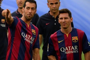 Sergio Busquets y Lionel Messi