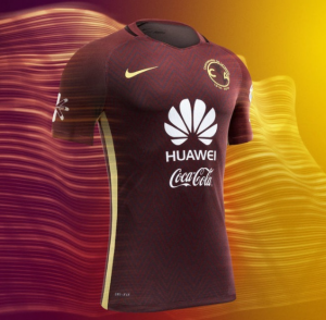 Nueva camiseta oficial de visitante del club américa para celebrar su centenario. Vinotinto con amarillo.