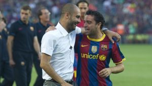 Xavi y Pep celebrando con el Barca