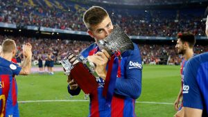 Piqué celebrando un título con Barcelona