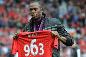 Bolt con la camiseta del United