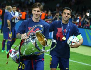 Xavi y Messi en el Barcelona