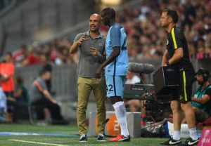 Pep Guardiola y Touré en el City