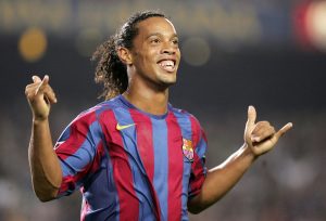 Ronaldinho Gaucho sonriendo con Barcelona