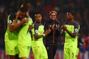 Klopp con el Liverpool celebrando