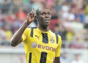 usain bolt con la camiseta del borussia dortmund
