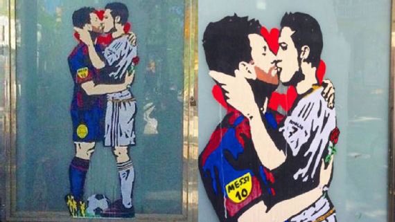 el romantico beso de messi y cristiano, graffiti en barcelona