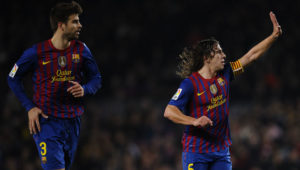 Puyol y Piqué en el Camp Nou
