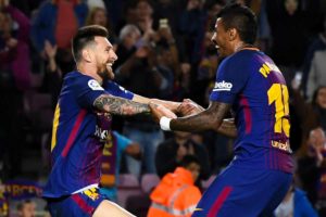 Messi y Paulinho con el Barca