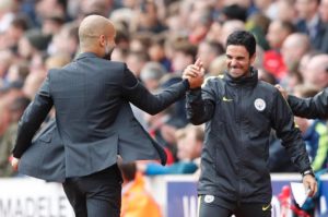 Arteta con Pep en el City