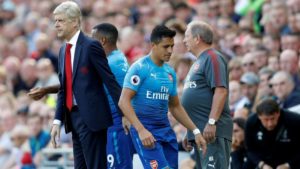 Wenger con Alexis en la Premier