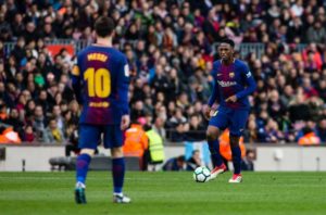 el defensor colombiano yerry mina y leo messi con el FC Brcelona