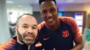 Mina con Iniesta