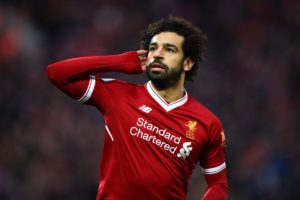 salah celebra un gol con el liverpool